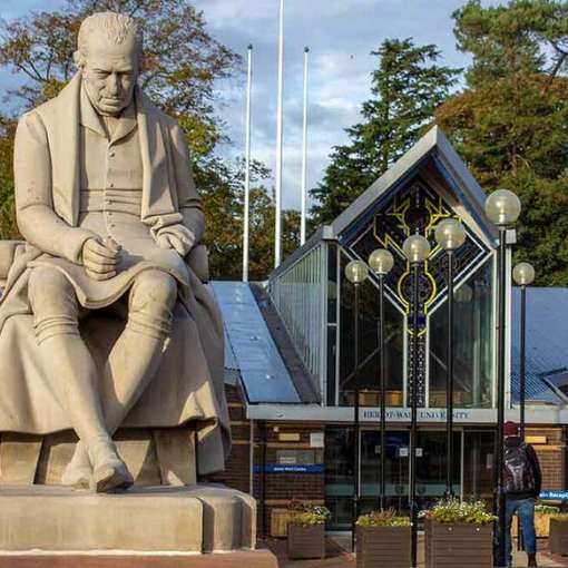 View of James Watt Statue located at the main entrance to Heriot-Watt University Edinburgh Campus.