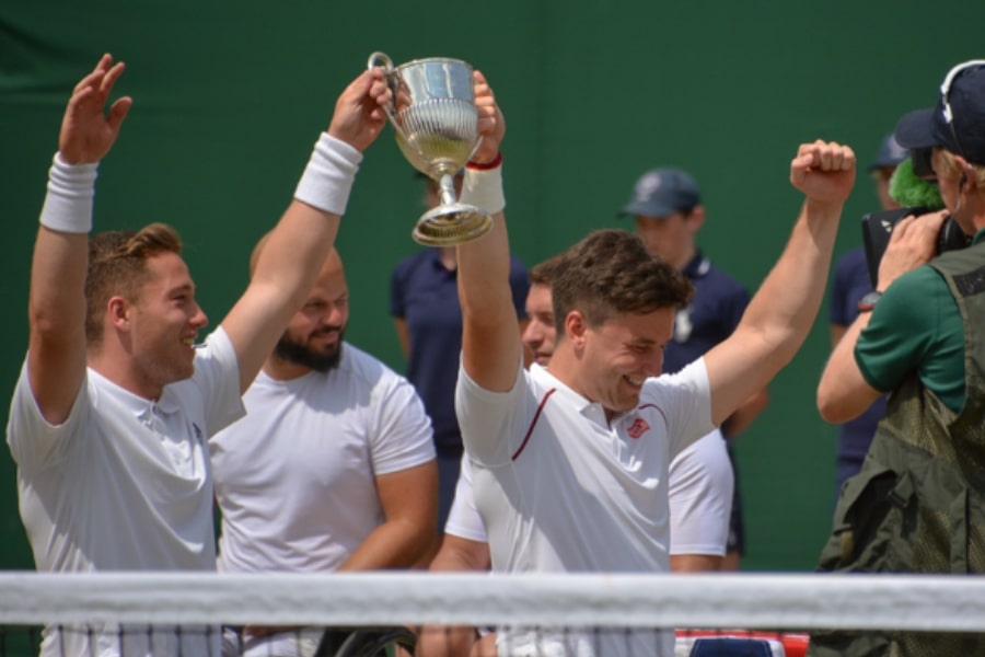 Gordon Reid and Alfie Hewett celebrate Wimbledon victory