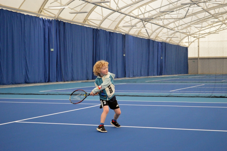 Patrick, Aged 5, winner of Oriam's Big Tennis Rally on court for the first serve at Oriam Indoor Tennis Centre