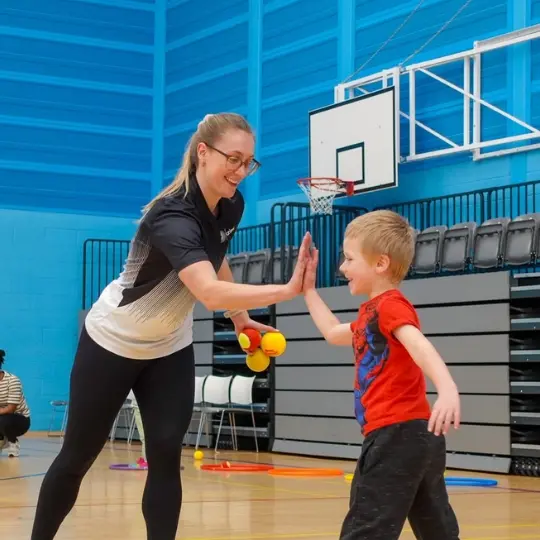 Coach encouraging child